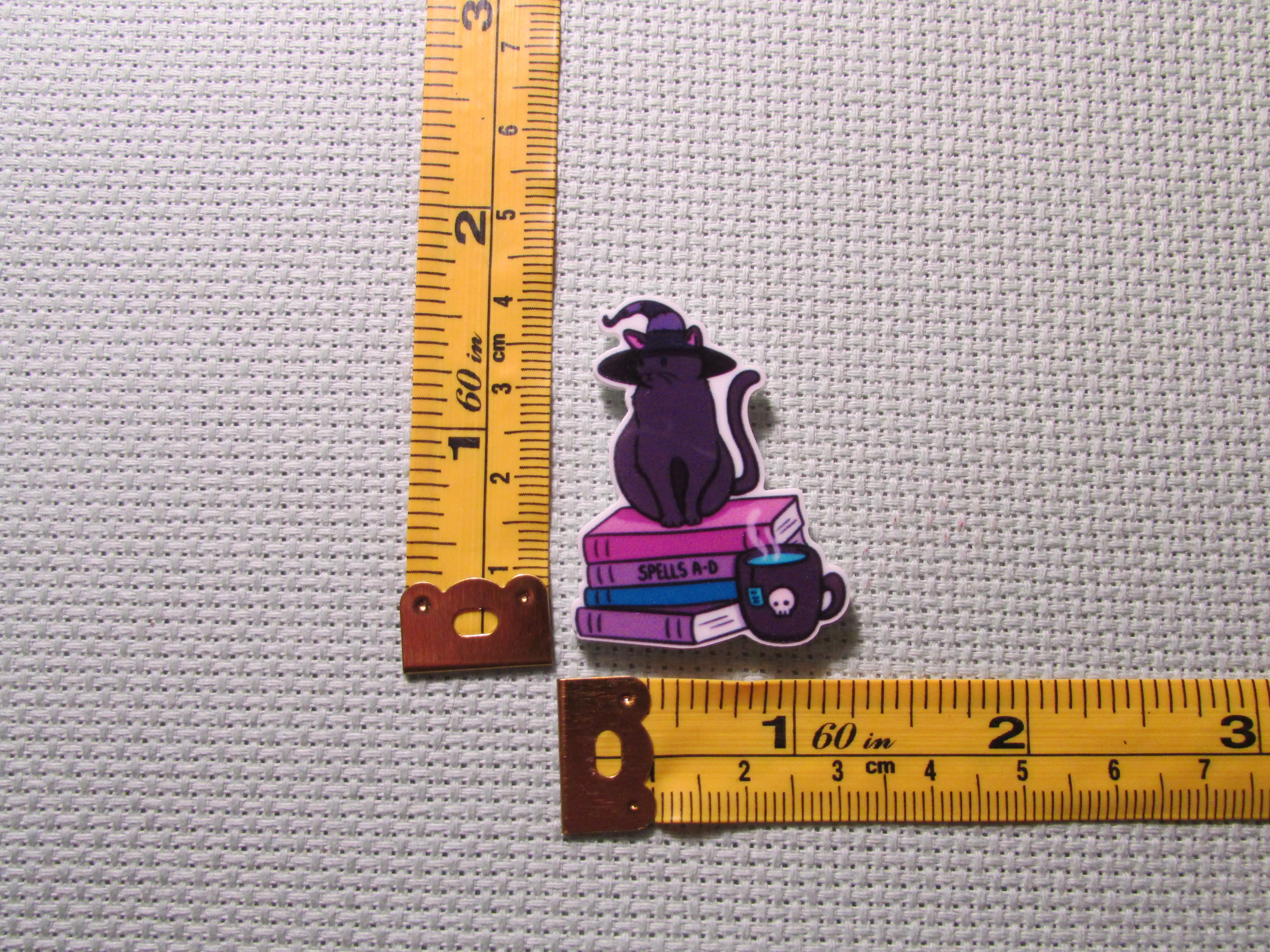 Purple Witch Cat Sitting on a Stack of Books Needle Minder, Cover Minder, Magnet
