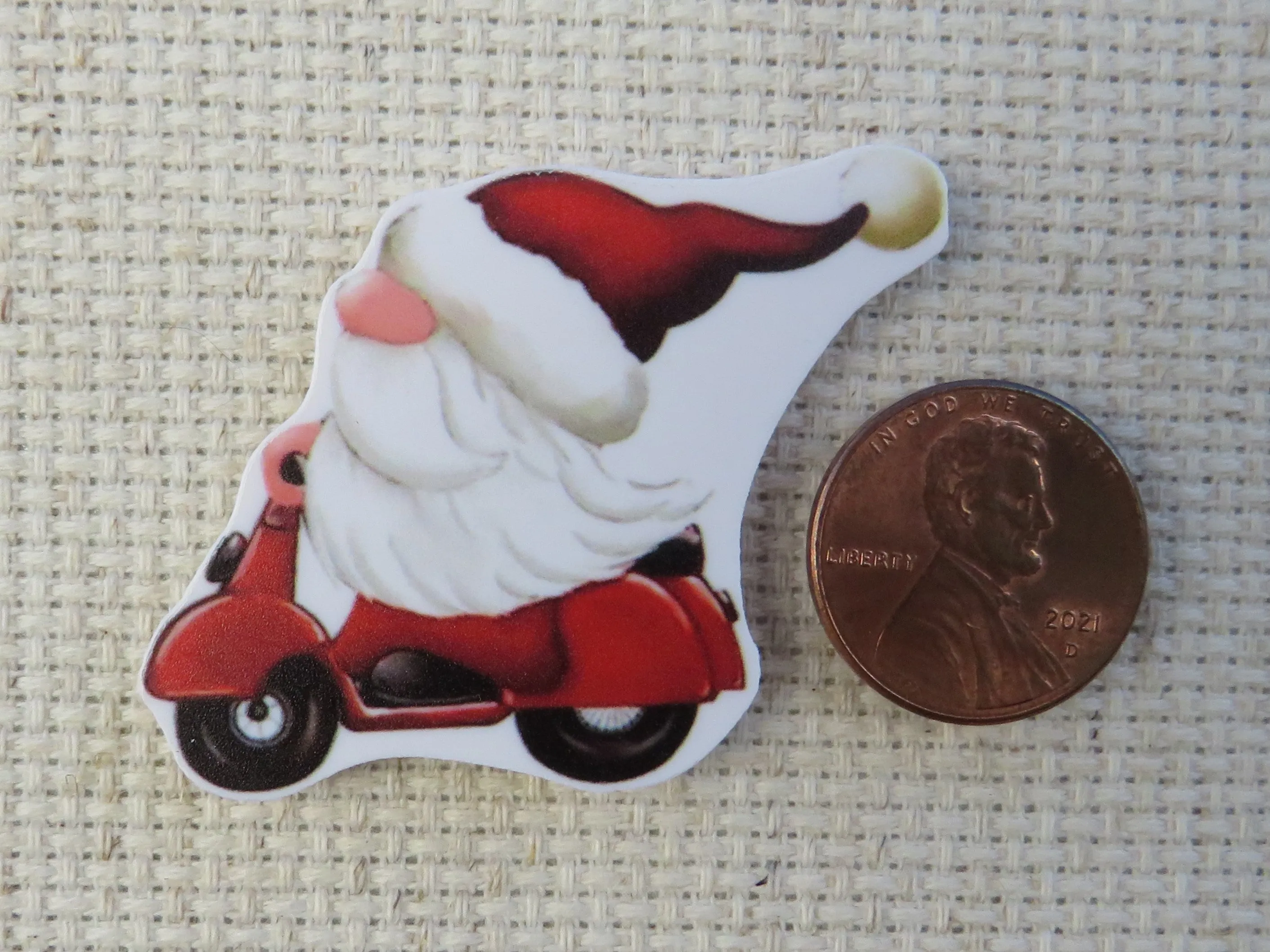 Santa Gnome Riding a Scooter Needle Minder, Cover Minder, Magnet